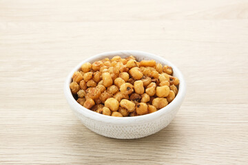 Marning, heap of crispy roasted corn kernels, traditional snack from Indonesia
