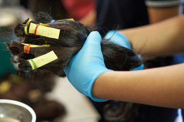 Making wig with real hair for cancer patient in Thailand 