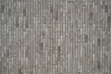 Gray vertical Brick wall texture as backdrop