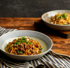 Two Portion of Asian Food, Rice Noodles