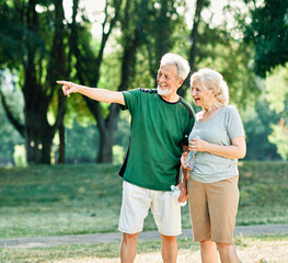 Fototapeta premium woman senior man outdoor running couple lifestyle sport smiling together jogging healthy nature fit happy active retirement exercise fitness run