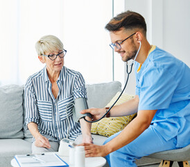 nurse doctor senior care caregiver help check exam blood pressure check pulse retirement home...