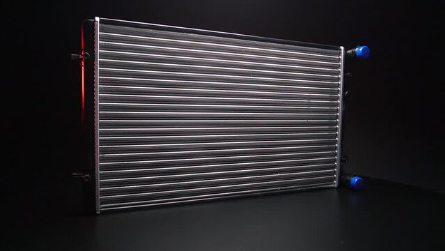 a new aluminum radiator for cooling antifreeze in the car engine