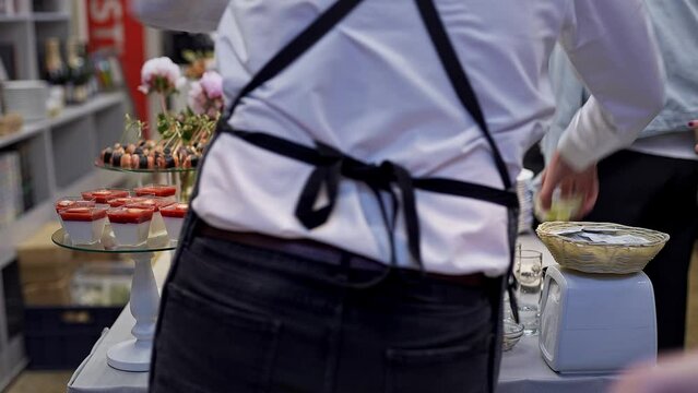 Richly served table with delicious snacks. Business event with a free buffet, delicious and gourmet sandwiches, canap s and bruschettas for visitors.