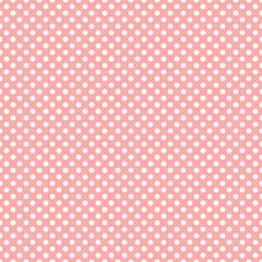 Seamless white polka dot pattern on pink background