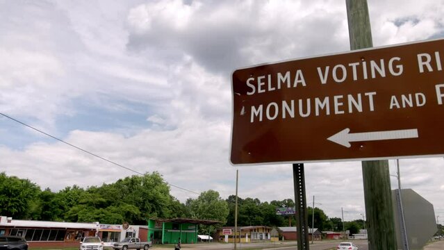 Selma Voting Rights Monument sign in Selma, Alabama with video panning left to right.