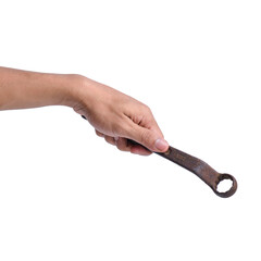 An isolated Hand Holding a Rusty Mechanical Key on White Background