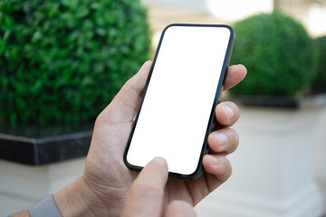 man hand hold phone with isolated screen on the street