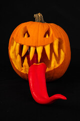 spooky jack-o'-lantern with a tongue for Halloween