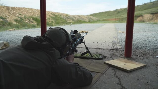shooter performs the exercise competitions in high-precision shooting