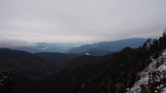 Uttarakhand. India. 23rd Jan 2022.A beautiful shot Himalaya Mountain peaks and valleys during winters. Karitk Swami Hill top peak in Uttarakhand India.