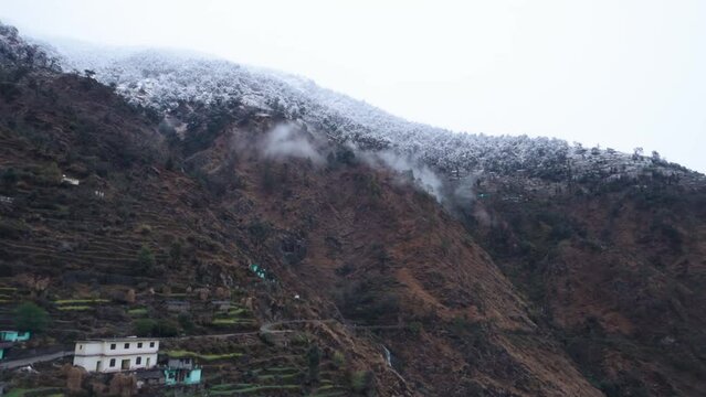 Uttarakhand. India. 23rd Jan 2022.A beautiful cinematic shot of Madmaheshwar Mahadev mountain peaks. Ransi Village in Chamoli garhwal.