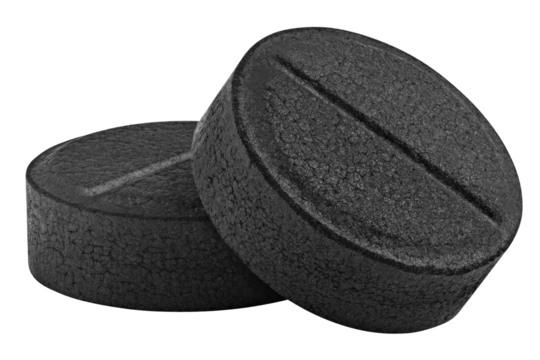activated Charcoal Pills, isolated on white background, full depth of field