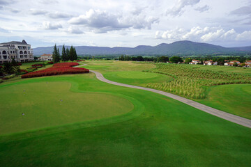 Beautiful views of the golf course with a mountain landscape background and a beautiful public landscape.