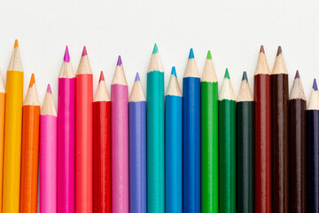 Collection of Colored Pencils on a White Background