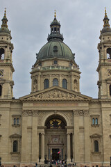 Fototapeta premium Budapest, Hungary - View of St. Stephen\'s Basilica, a Roman Catholic basilica. Panorama of a typical pedestrian street in the center of Budapest in the tourist part of the old town.