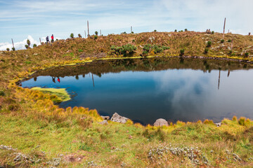 A crater lake on the summit of Mount Muhabura in the Mgahinga Gorilla National Park, Uganda