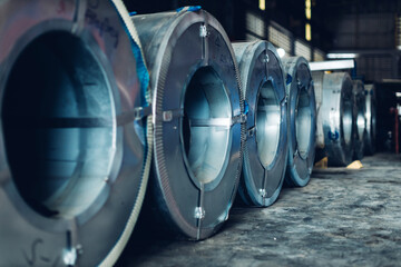 Roll of steel sheet in a plant. Rolls of sheet steel of Factory. Coils of steel stripes in store....