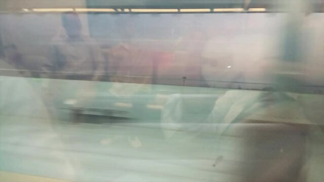Fast-passing metro trains moving around the city. 4K footage.