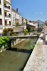 France, Montargis. Cityscape with a canal. May 29, 2023.