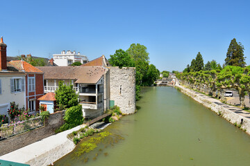 Fototapeta na wymiar France, Montargis. Cityscape with a canal. May 29, 2023.
