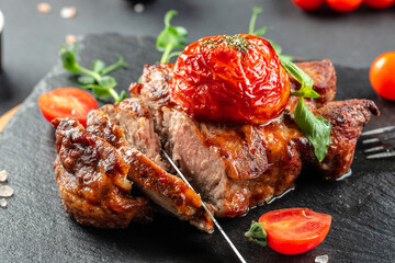 Juicy steak medium rare beef with tomatoes, Restaurant menu, dieting, cookbook recipe top view