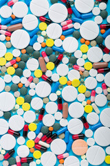 Fototapeta premium Background of many medical pills, top view