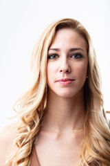 Fototapeta premium Confident blonde, eyes smiling, defiant
