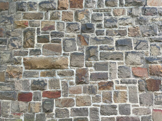 Stone Wall Texture with big bricks on ancient historic church in Germany, Europe