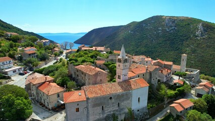 Fototapeta premium Plomin - Croatia - An aerial view with the drone over the beautiful town of Plomin