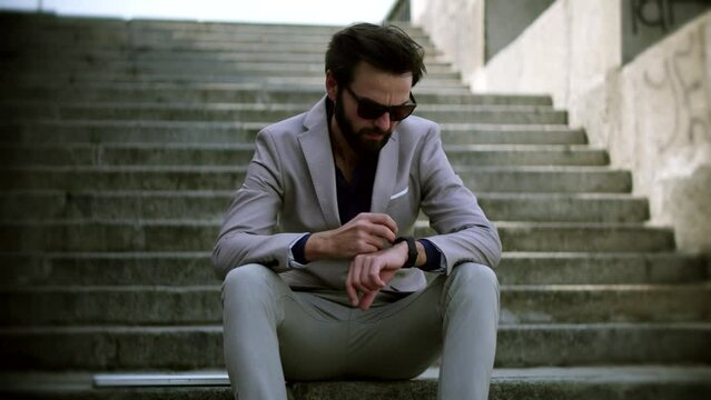 Man using smart watch wearable wristband device