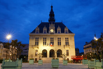 Fototapeta premium The town hall of Vincennes city at dawn. It is listed as historical monument. France.
