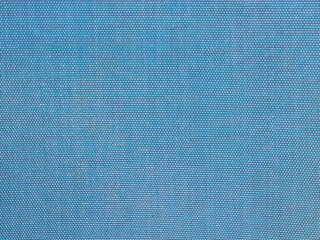 Closeup of textured blue canvas fabric