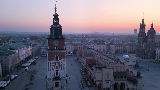 krakow city old town market square aerial view drone at sunrise dawn,flying around town hall tower