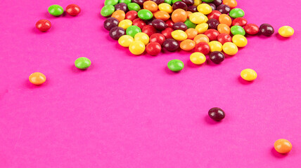 Different colored round candy.