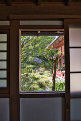 A view of the Japanese garden through the window frame.  Kyoto Japan

