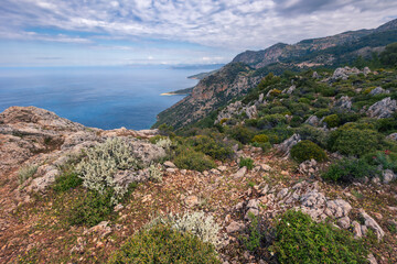 Fototapeta na wymiar Panoramic landscape from rocky hill top to coastline, mountains, beaches and sea, Lycian Way, Turkey