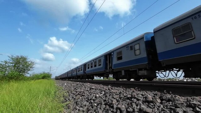 A local commuter train on the Pune to Daund route, at Uruli near Pune India.