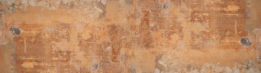 Obraz na płótnie Canvas Old brown gray rusty vintage worn shabby patchwork motif tiles stone concrete cement wall texture background banner panorama.