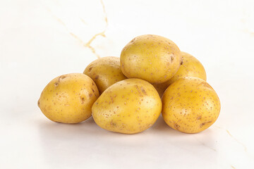 Raw young baby potato heap