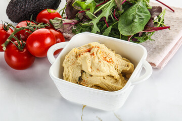 Creamy hummus in the bowl