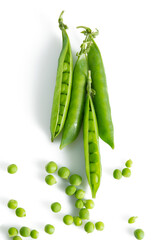 Fresh green vegetable pea pods and beans isolated on white background