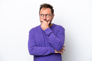 Middle age caucasian man isolated on white background having doubts and with confuse face expression