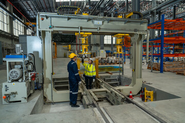 Fototapeta premium Railway engineers and technicians checking train repair and maintenance tools in shed