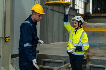 Railway engineers and technicians checking train repair and maintenance tools in shed