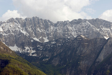 Fototapeta premium Spring landscape in the Triglav National Park. Breathtaking peaks of the Julian Alps. Triglav National Park, Slovenia, Europe