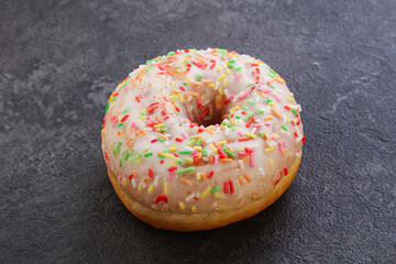 Sweet glazed vanilla donut with icing