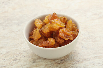 Sweet yellow raisin in the bowl