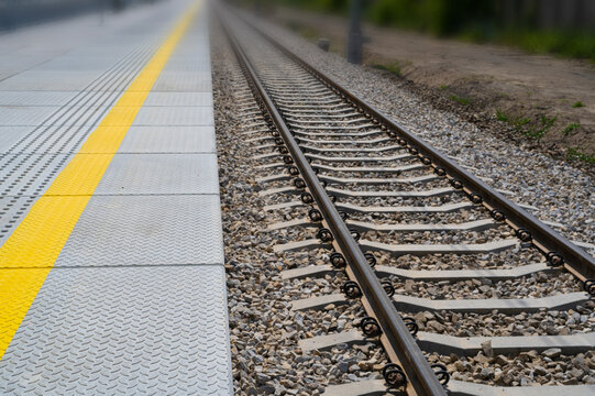 Railway Lines Closeup, Train Tracks with Track Ballast Stones, Metal Rails, Old Railway Track