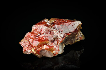 hematoid quartz isolated on black background. macro detail texture. close-up polished semi-precious...